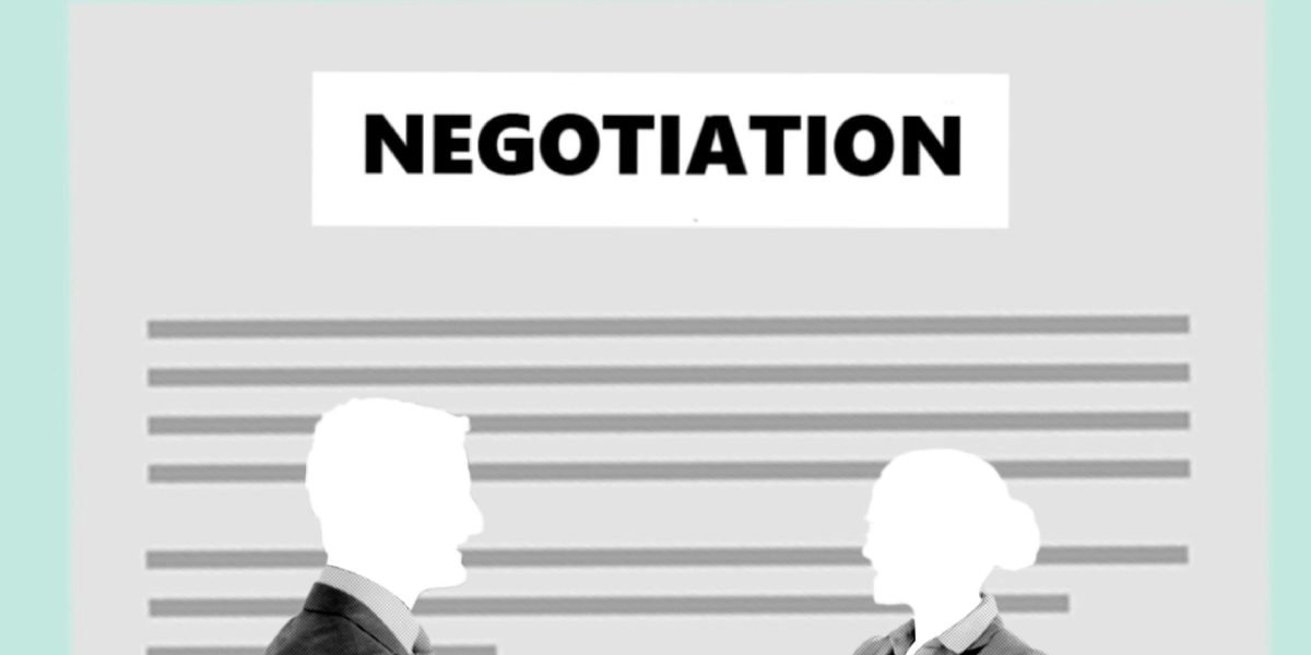 A handshake between two individuals, symbolizing a successful negotiation or agreement in a rental process.